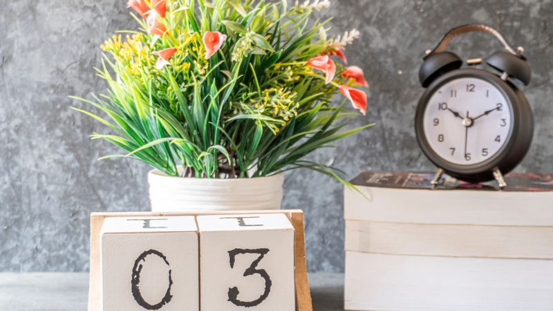 Clock and date blocks symbolising how often counselling sessions are scheduled
